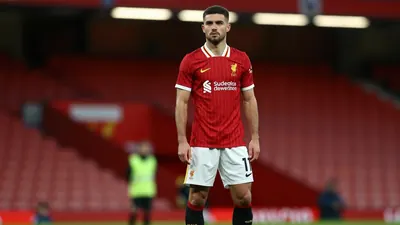 Liverpool F.C. midfielder Curtis Jones' transfer to Inter Milan is in limbo as he tries to force through a move, sparking...