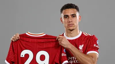 Liverpool FC's record signing Bradley Barcola selects the number 29 shirt, influenced by a FIFA video game icon, joining...
